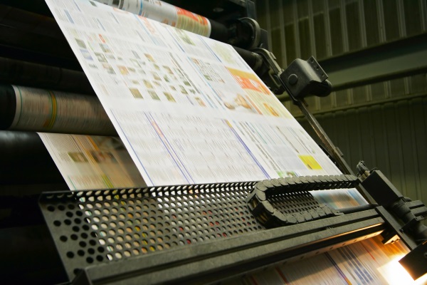 Photo of an newspaper being printed